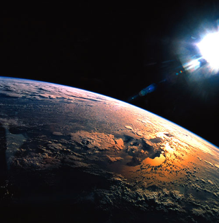 Satellite view at 4:50 p.m. EST shows the sun disappearing from the sky.